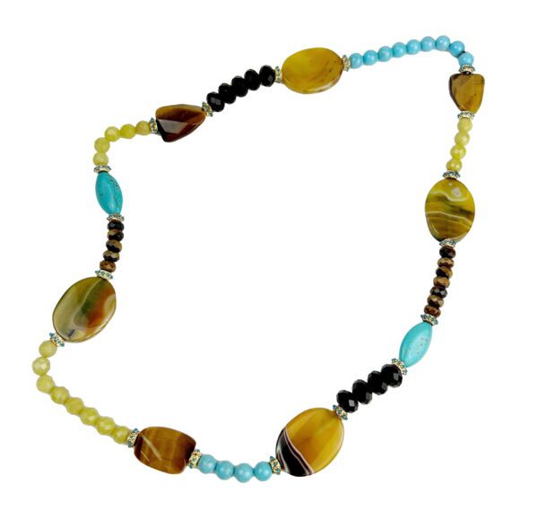 A necklace of various colored beads and stones.