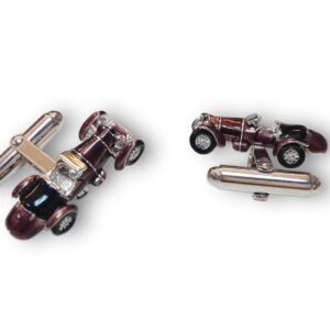A pair of cufflinks with an old style tractor.