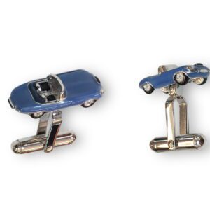 A pair of cufflinks with a blue car and a white car.