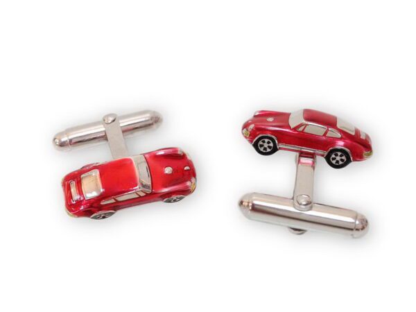 A pair of red car cufflinks with silver trim.