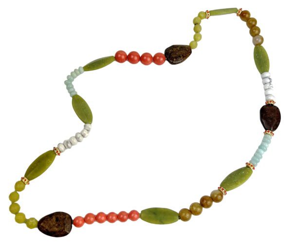 A long necklace with beads and wooden pieces.