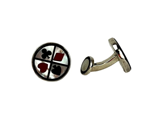 A pair of cufflinks with a red and black design.