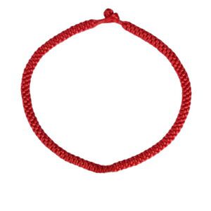 A red rope necklace with an oval shaped clasp.