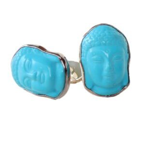 A pair of buddha head earrings in blue.