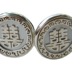 A pair of cufflinks with the chinese symbol for double happiness.