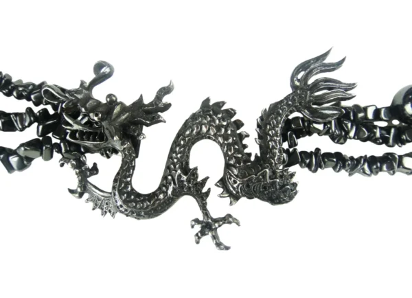 A silver dragon is shown on the wall.