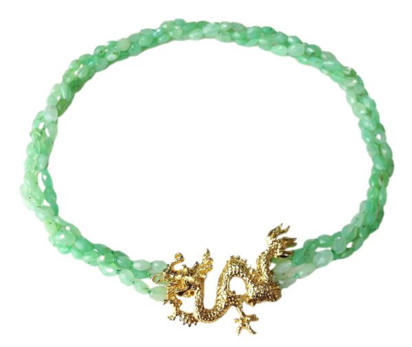 A green bead necklace with gold dragon clasp.