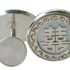 A pair of silver earrings with chinese symbols.
