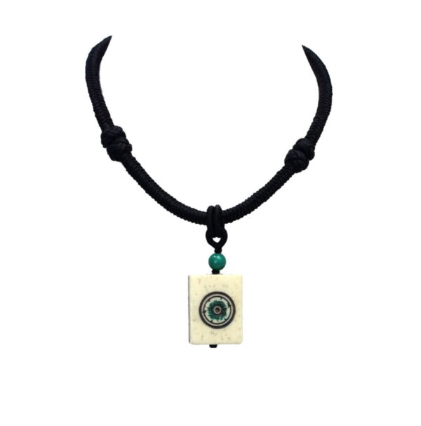 A necklace with a square pendant and a bead.