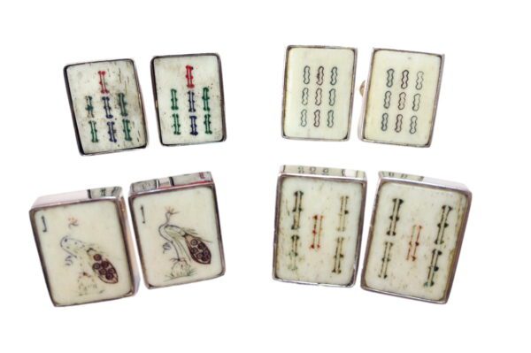 A set of four boxes with different types of insects on them.