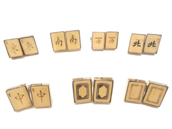 A set of six wooden blocks with chinese characters.