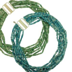Two necklaces of green and blue glass beads.