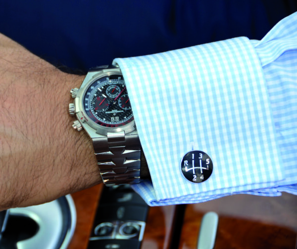 A man wearing a watch and a shirt