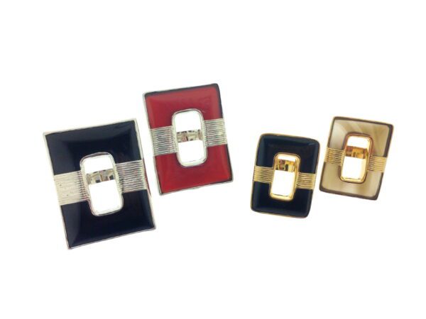 Four Rectangular Agate Wrap Rings in different colors (black, red, blue, brown) with central metallic clasps, isolated on a white background.