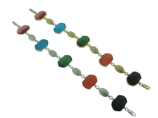A pair of colorful bracelets with different colored stones.