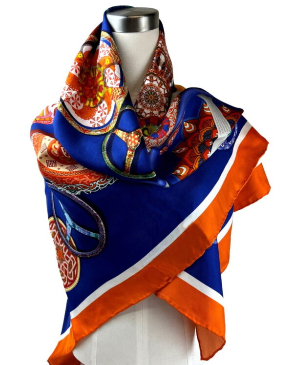 A blue and orange scarf is on display.