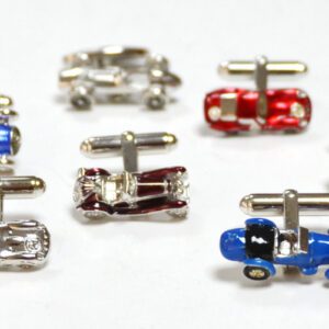 A group of cufflinks that are shaped like cars.