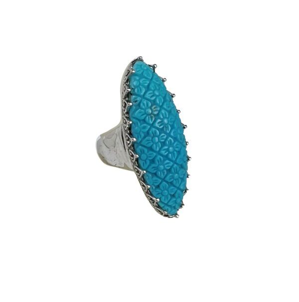 A silver ring with blue stones on it.