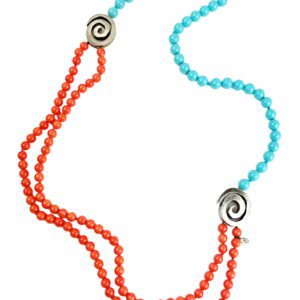 A long necklace with two spiral beads and turquoise beads.