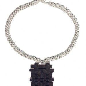 A necklace with a black square pendant on it.