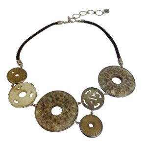 A necklace with several circular discs on it.