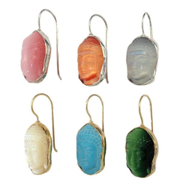 Six different colored earrings are hanging on a white background.