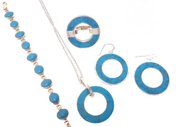 A set of jewelry that includes necklaces, earrings and bracelets.