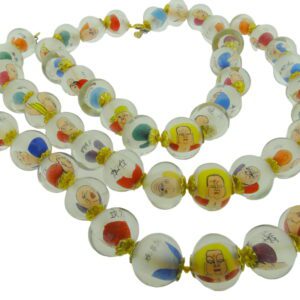 A long necklace of glass beads with cartoon characters.