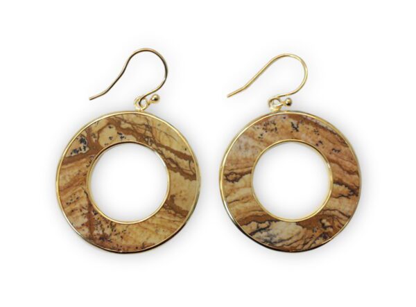 Sentence with product name: A pair of Fancy Stone Donut Wrapped Earrings with a central cut-out, hanging from gold hooks, isolated on a white background.