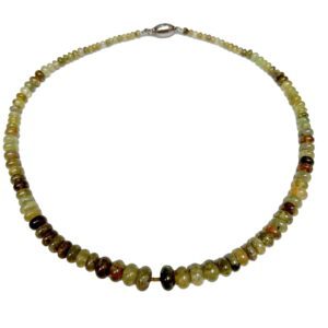 A necklace of green and brown beads is shown.