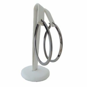 Two Oval & Round Hoop Earrings displayed on a white, modern stand with a circular base isolated on a white background.