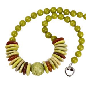 A necklace with yellow beads and red accents.