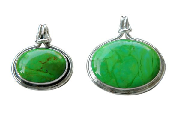 Two green pendants are shown side by side.