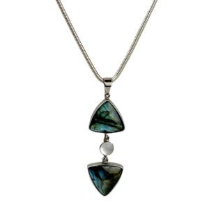 A necklace with two triangular shaped stones and a pearl.