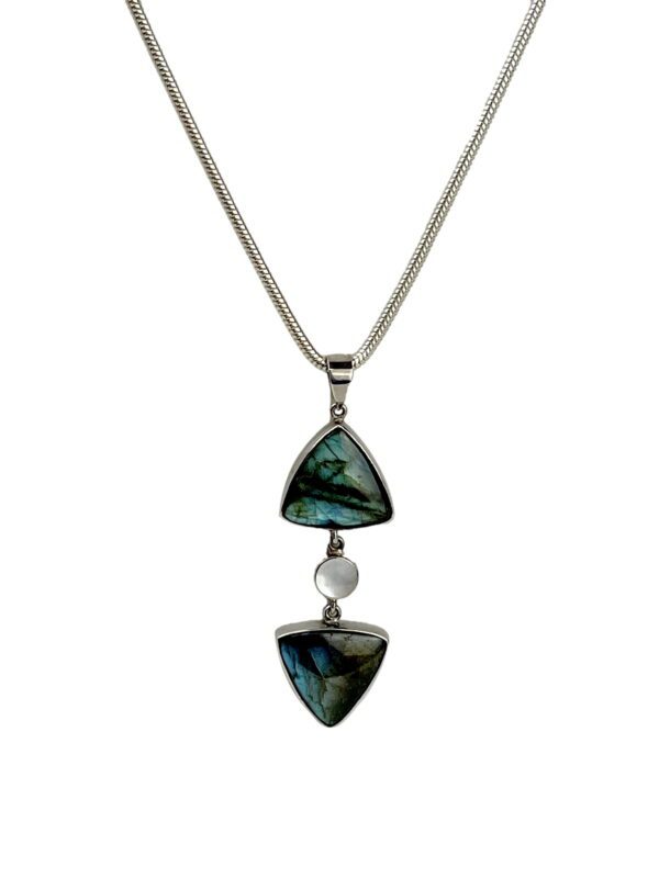 A necklace with two triangular shaped stones and a pearl.