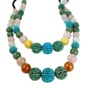 A necklace with beads and stones on it