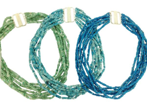 A group of three necklaces that are all different colors.