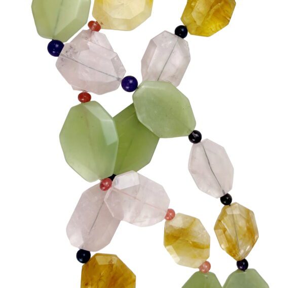 A long necklace of various shapes and colors.