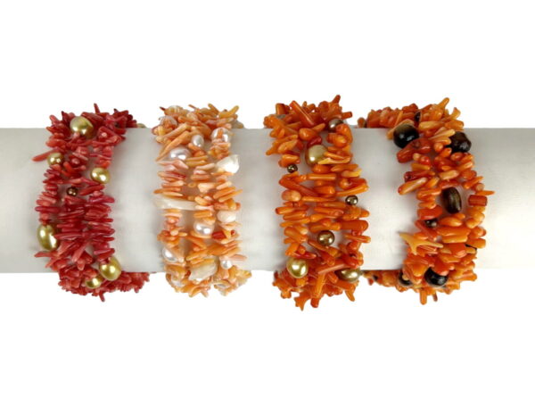 A row of different colored bracelets with various designs.