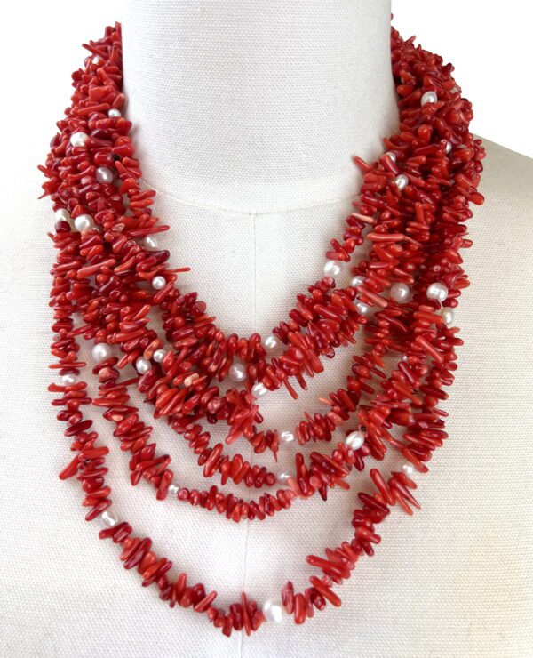 A necklace of red coral and white pearls.