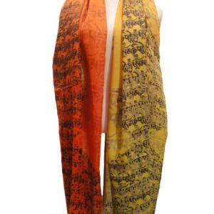 A yellow and orange scarf with an animal print.