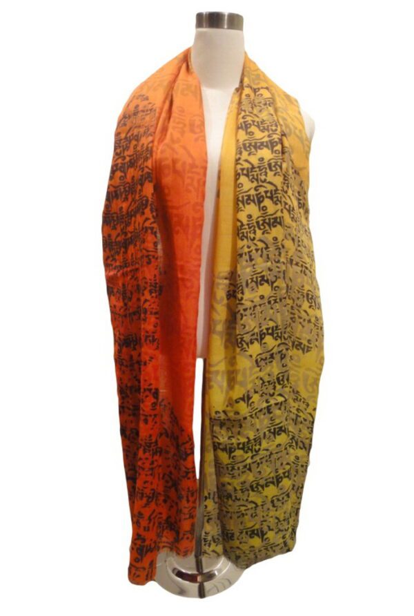 A yellow and orange scarf with an animal print.