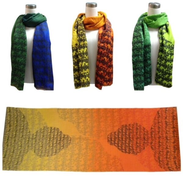 Three different colored scarves on display next to each other.