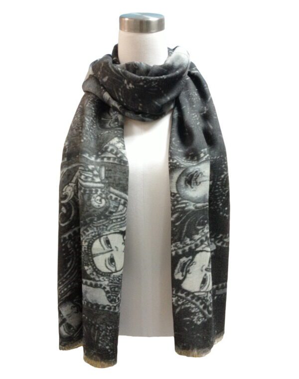 A Multi Buddha Scarf featuring a paisley and floral design draped over a mannequin.