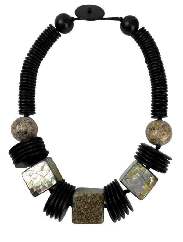 A necklace with black and silver beads on it.