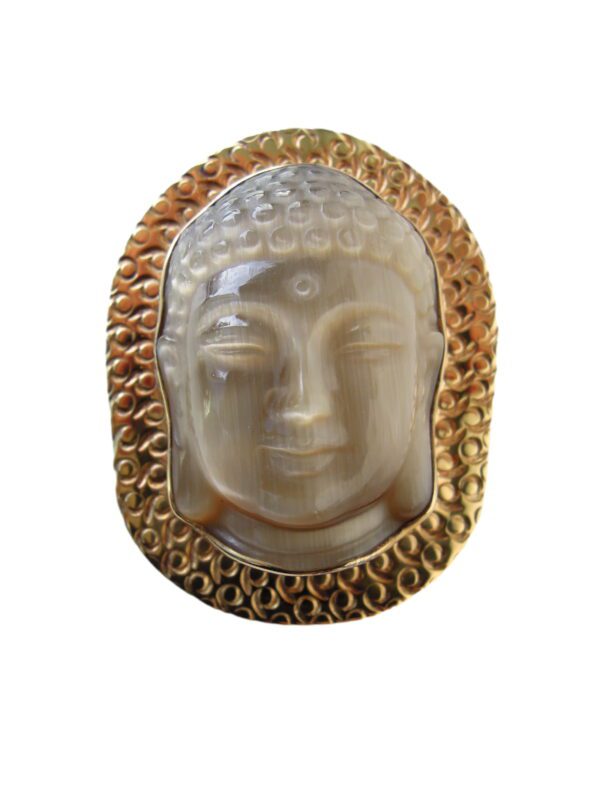 Carved Buddha Silhouette Brooch / Pendant in ivory with a detailed textured halo on a white background.