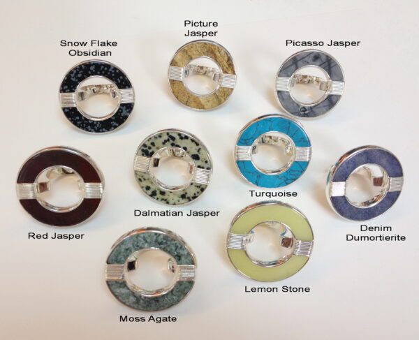 An array of Fancy Stone Donut Wrapped Rings labeled with types, including Snow Flake, Picasso Jasper, and Turquoise, displayed on a white background.