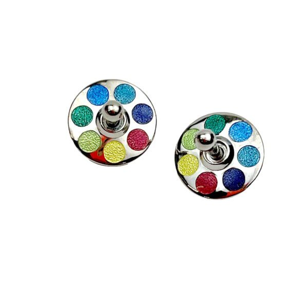 A pair of earrings with colorful dots on them.