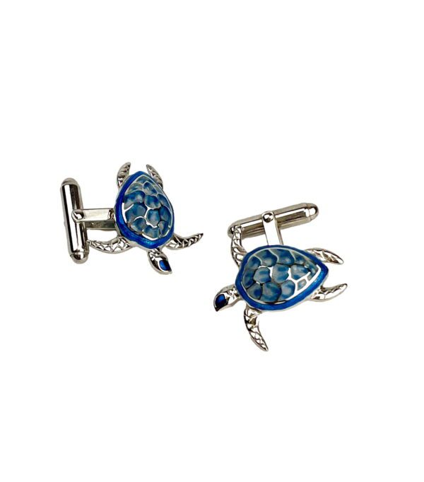 A pair of turtle cufflinks with blue and green enamel.