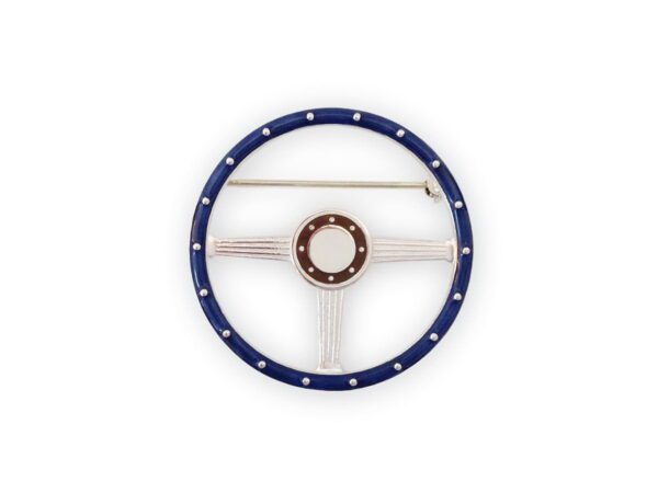 A steering wheel with blue and white plastic rim.